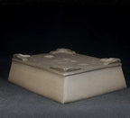 Taupe rectangular pot upside down showing corner feet