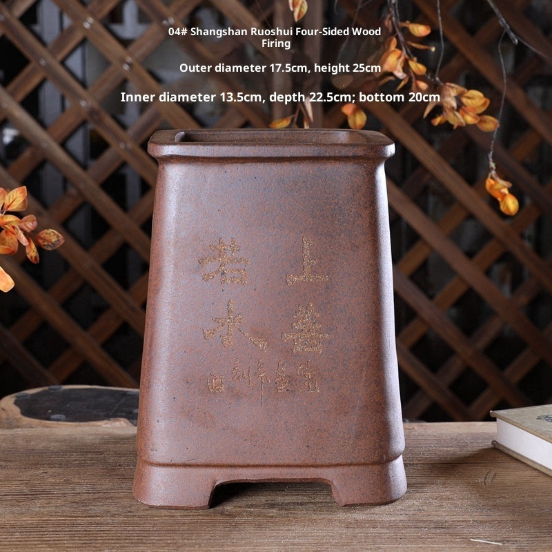 Tall brown square pot with landscape decoration and measurement labels