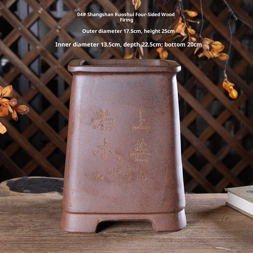 Tall brown square pot with landscape decoration and measurement labels
