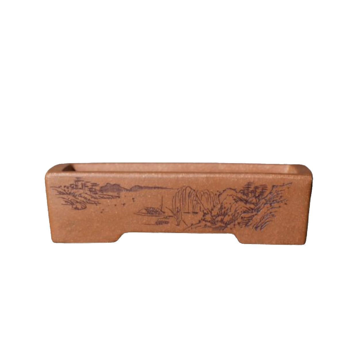 Isolated red-brown rectangular pot with landscape decoration
