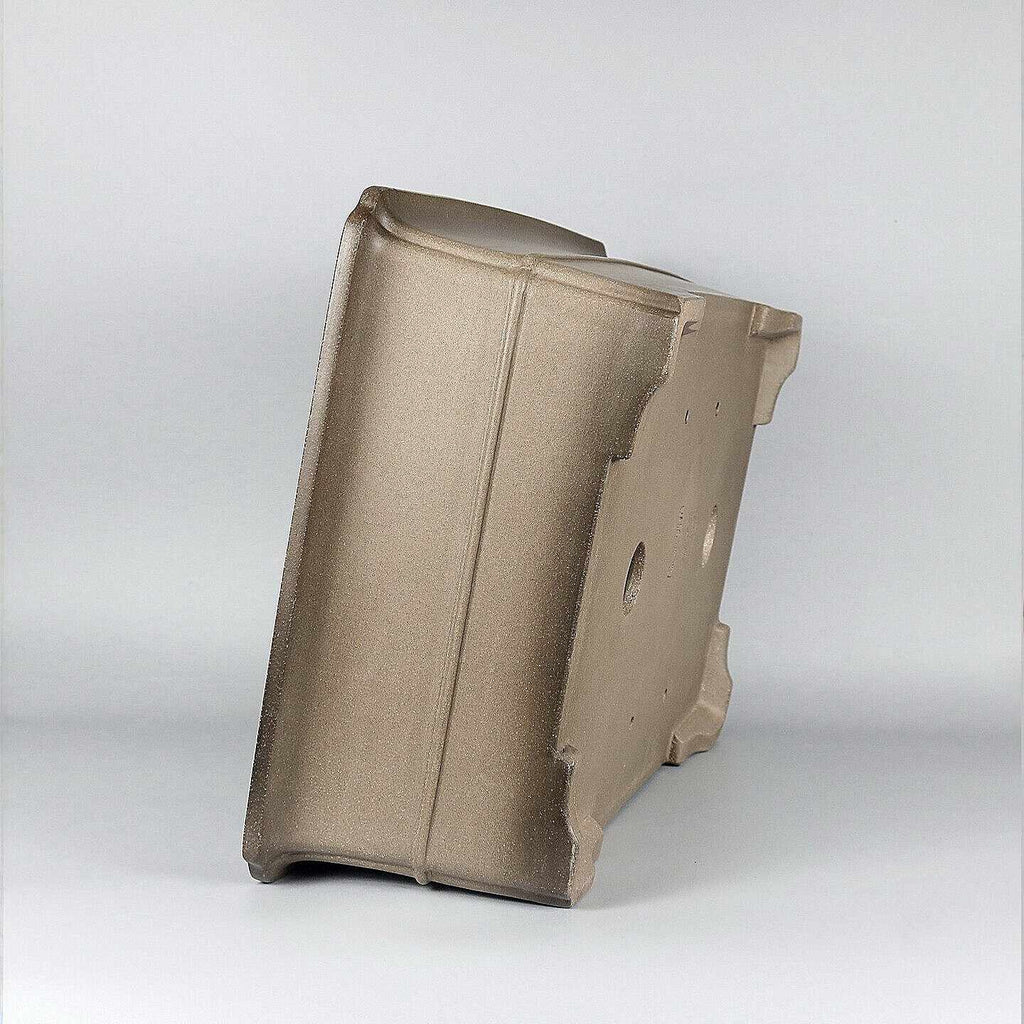 Taupe rectangular pot on its side showing wall and base