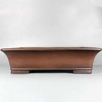 Brown rectangular bonsai pot with flared rim and low block feet