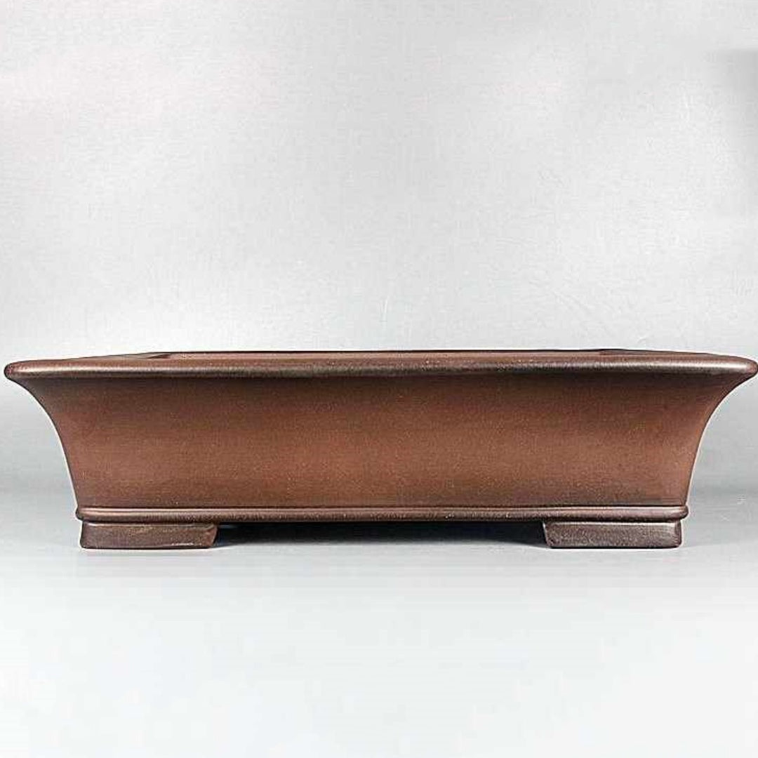 Brown rectangular bonsai pot with flared rim and low block feet