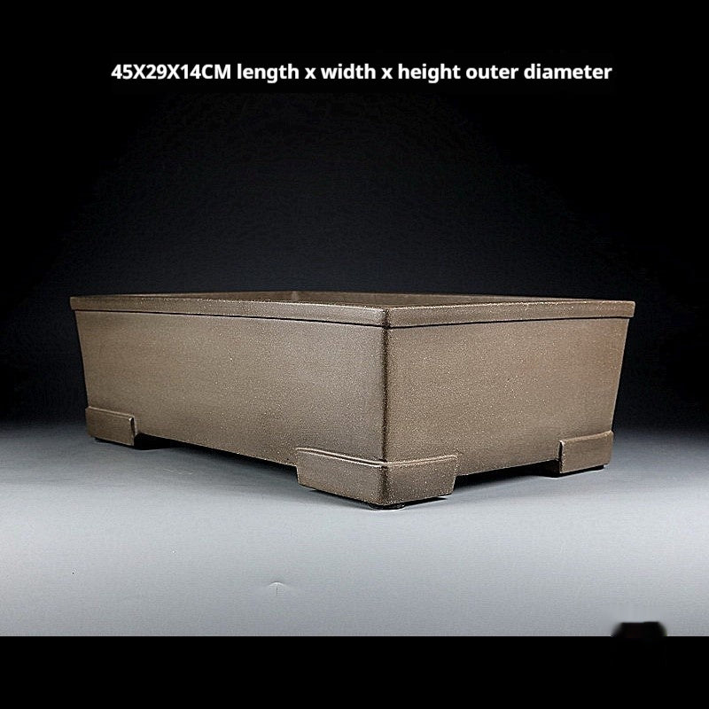 Angled taupe rectangular pot with measurement labels