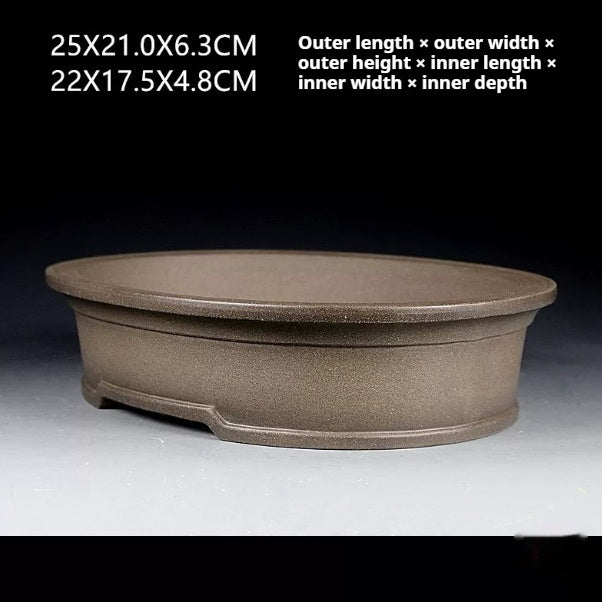 Taupe oval bonsai pot with exterior and interior measurement labels