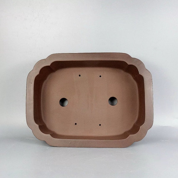 Paneled mokko pot interior with two drainage openings