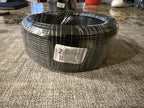 Front view of a wrapped wire coil with a visible 2.0 mm label
