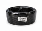 Wrapped dark wire coil with a label reading 2.0 mm and 0.5 kg