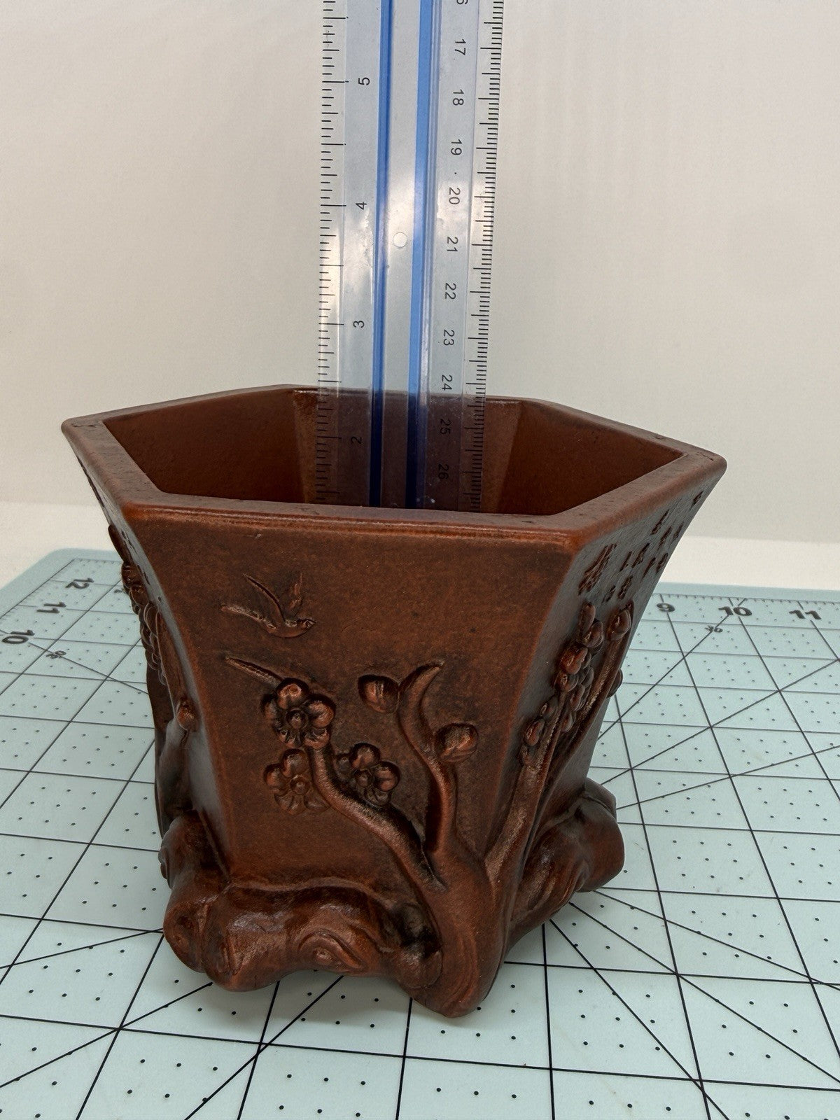 Ruler inside the tall hexagonal pot demonstrating its interior depth