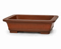 Warm brown rectangular bonsai pot with flared rim, tapered walls and short block feet