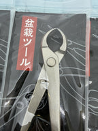 Packaged bonsai cutter with rounded jaws and long handles