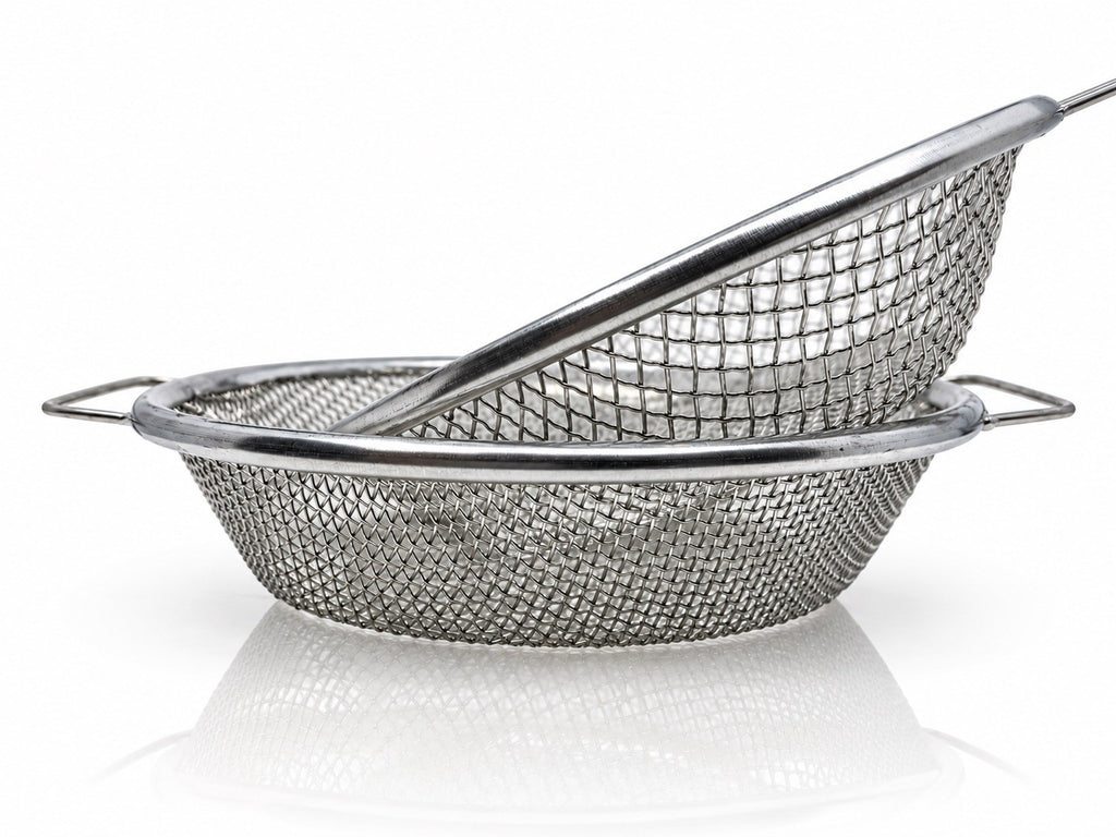 Two round metal soil sieves with different mesh sizes and side handles, nested at an angle