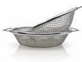 Two round metal soil sieves with different mesh sizes and side handles, nested at an angle