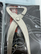 Close-up of a packaged bonsai cutter with broad end-cutting jaws