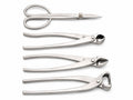 Four silver-colored bonsai tools arranged on white: scissors and three long-handled cutters
