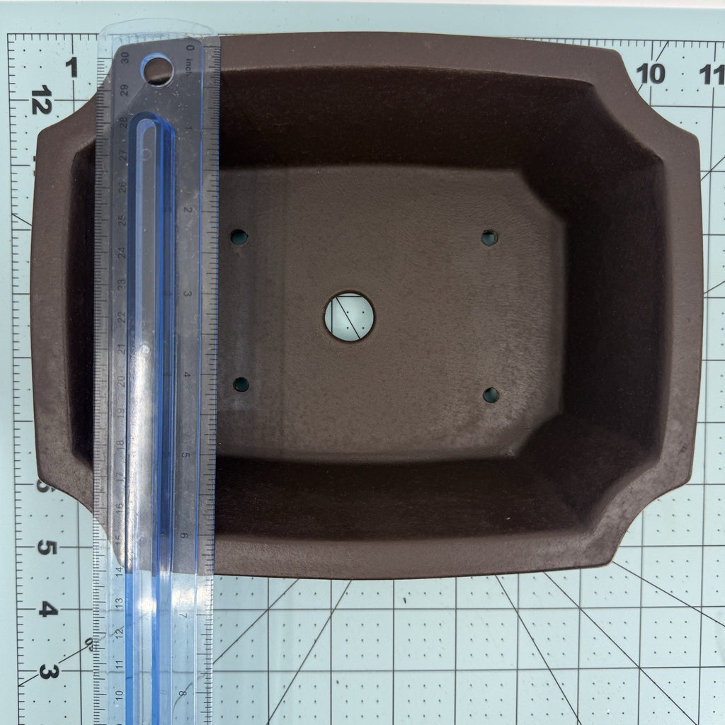 Ruler across the width of the dark rectangular pot's opening