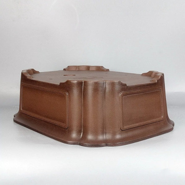 Paneled sides and low feet of mokko Zisha pot