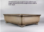 Angled taupe rectangular pot with measurement labels above