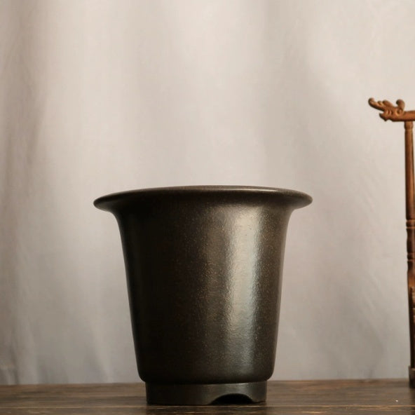 Alternate side view of dark tapered round pot