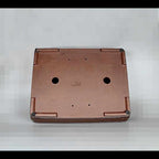 Underside of brown rectangular bonsai pot showing feet and two large openings
