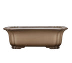 Isolated side view of taupe rectangular bonsai pot with corner feet
