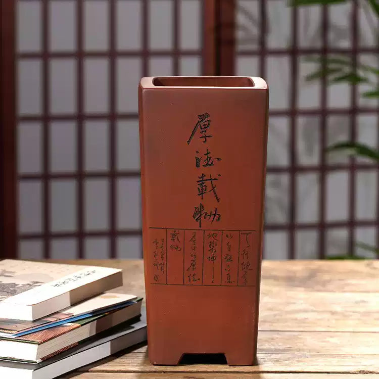 Tall reddish-brown square pot with calligraphy and rectangular seal designs