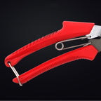 Close-up of red textured handles and wire retaining clip