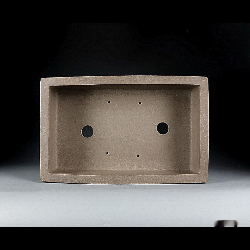 Top view of taupe rectangular pot showing two large openings and four small holes