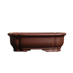 Brown mokko Yixing bonsai pot on white background