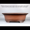 Brown oval pot with exterior and interior measurement labels