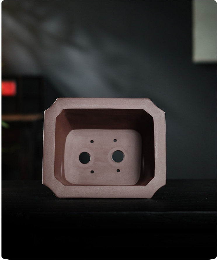 Interior drainage and wiring openings of deep Zisha bonsai pot