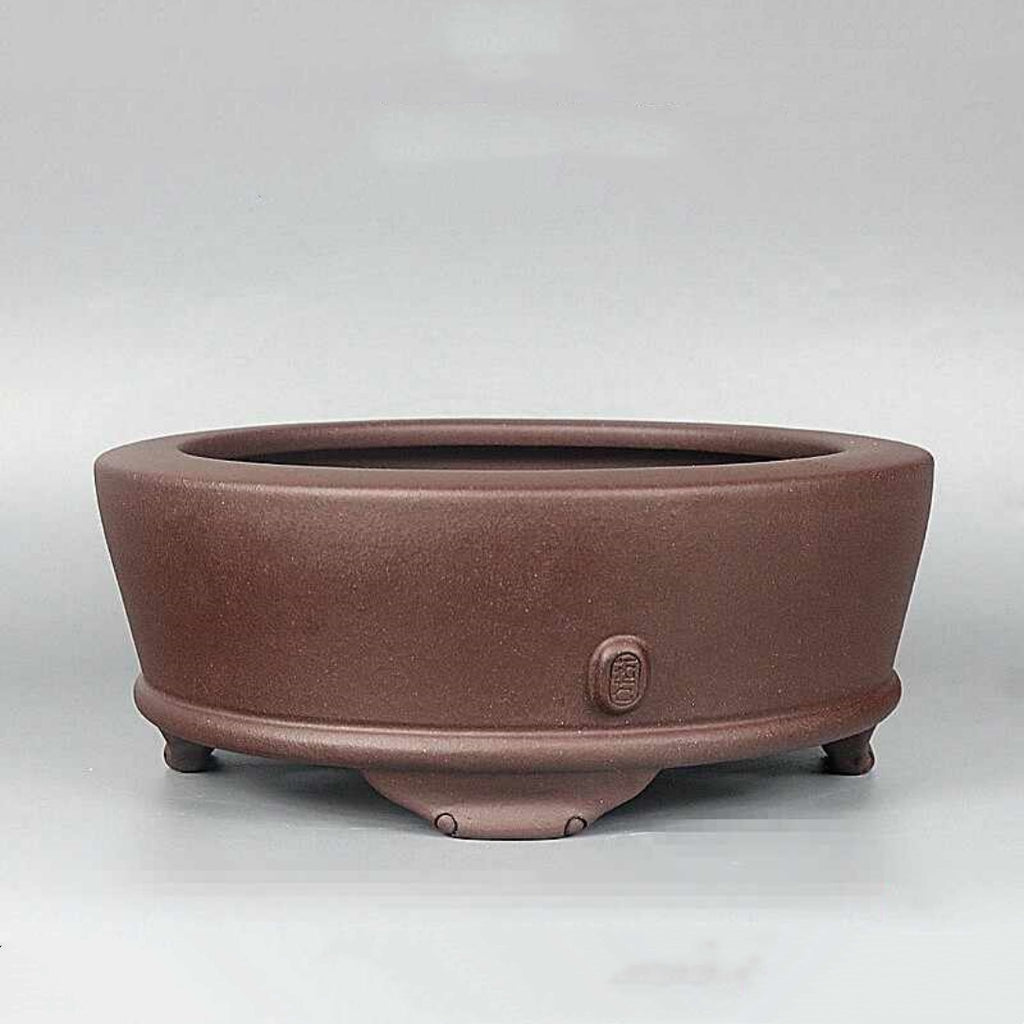 Brown round purple-clay bonsai pot, side view