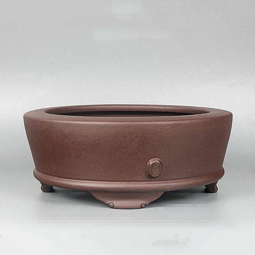 Brown round purple-clay bonsai pot, side view