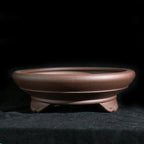 Brown round Zisha bonsai pot with cloud feet