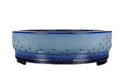 Light blue drum pot with dark blue base band and raised studs