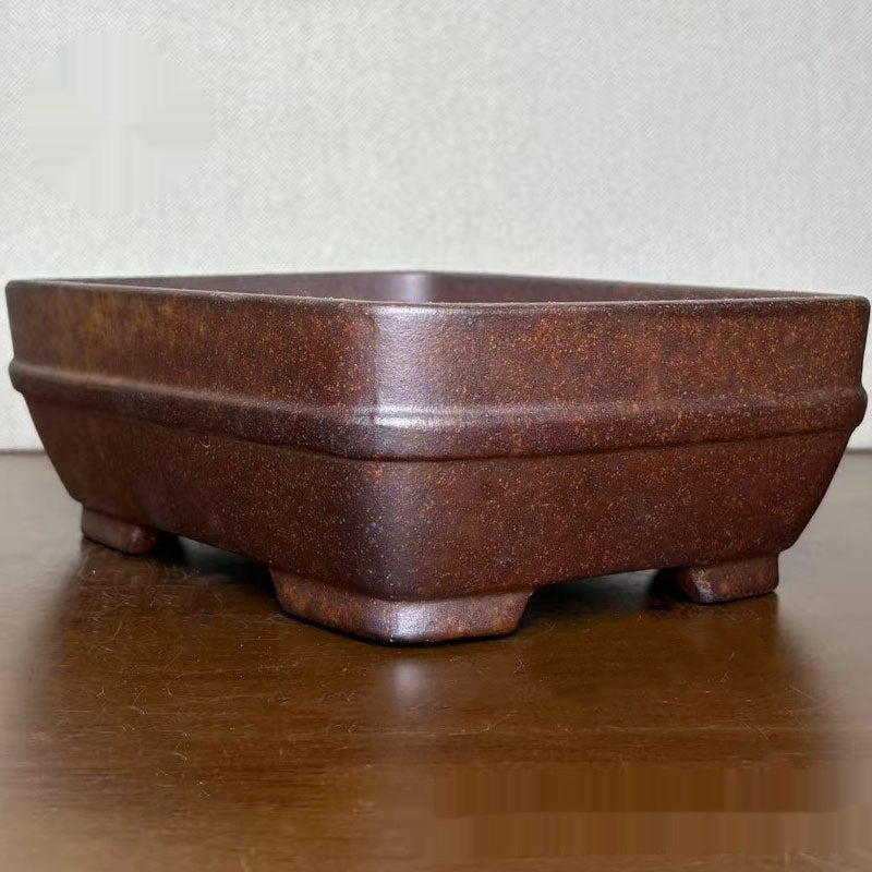 Rounded corner and band detail of stoneware bonsai pot