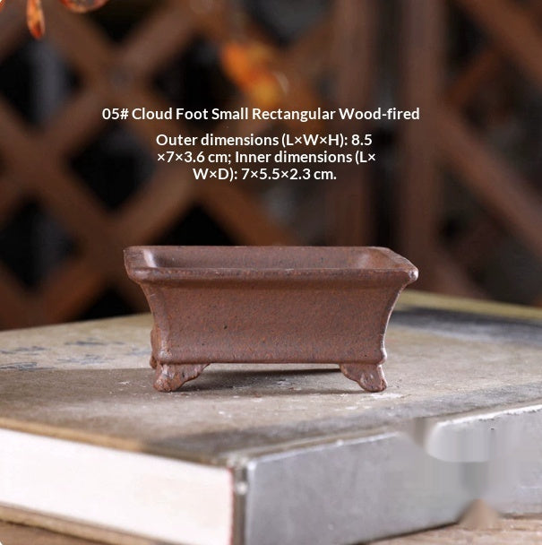 Small brown rectangular bonsai pot with a flared rim and curled feet, with dimensions above