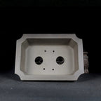 Taupe Zisha pot interior and corner-cut rim