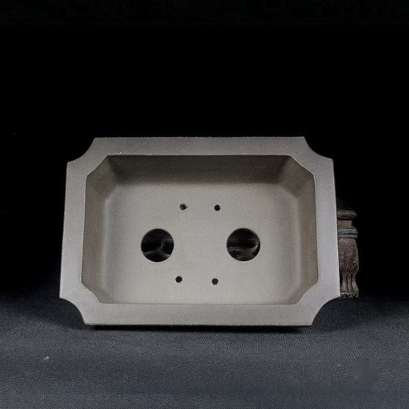 Taupe Zisha pot interior and corner-cut rim