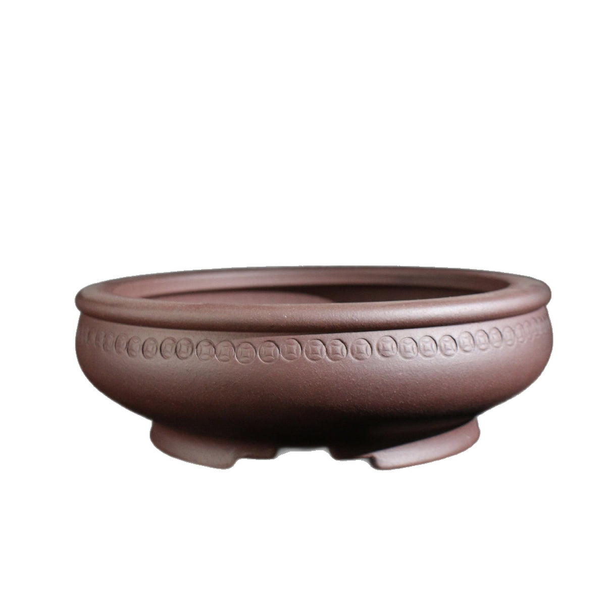 Isolated round brown pot with coin-like ornament band