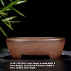 Side view of the brown oval pot with dimension labels