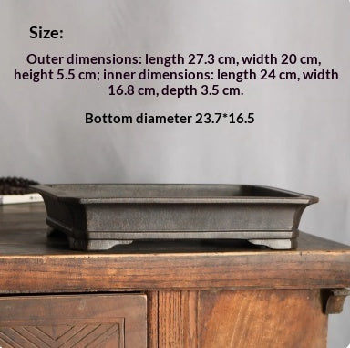 Dark rectangular pot with measurement labels above