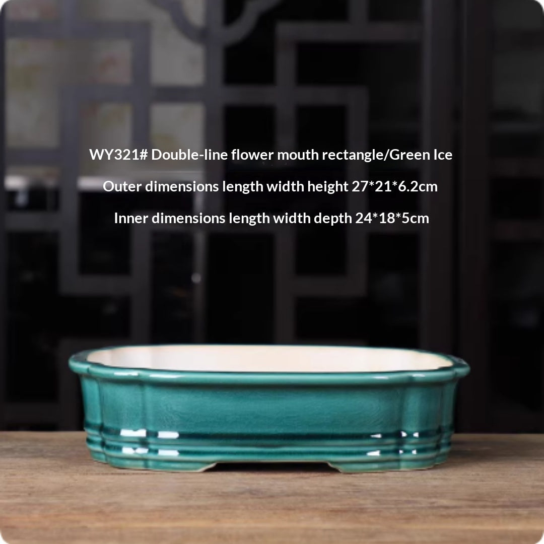 Deep green rectangular bonsai pot with rounded corners and double horizontal bands, with measurements above