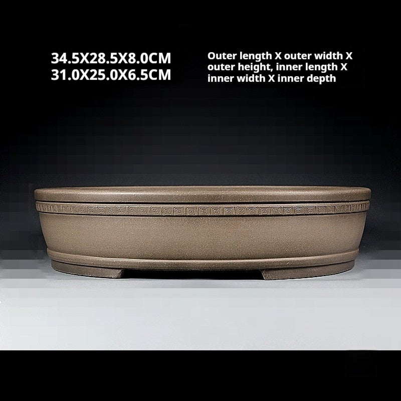 Front view of the banded taupe oval pot with size annotations