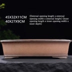 Brown rectangular pot with exterior and interior measurement labels