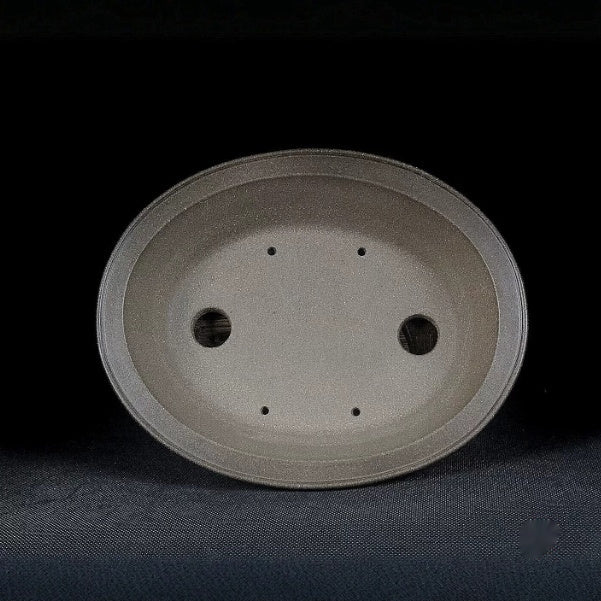 Oval Zisha pot interior with drainage and wiring holes