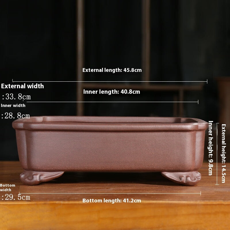 Reddish-brown rectangular pot with labeled exterior 45.8 × 33.8 × 14.5 cm and interior 40.8 × 28.8 × 9.8 cm