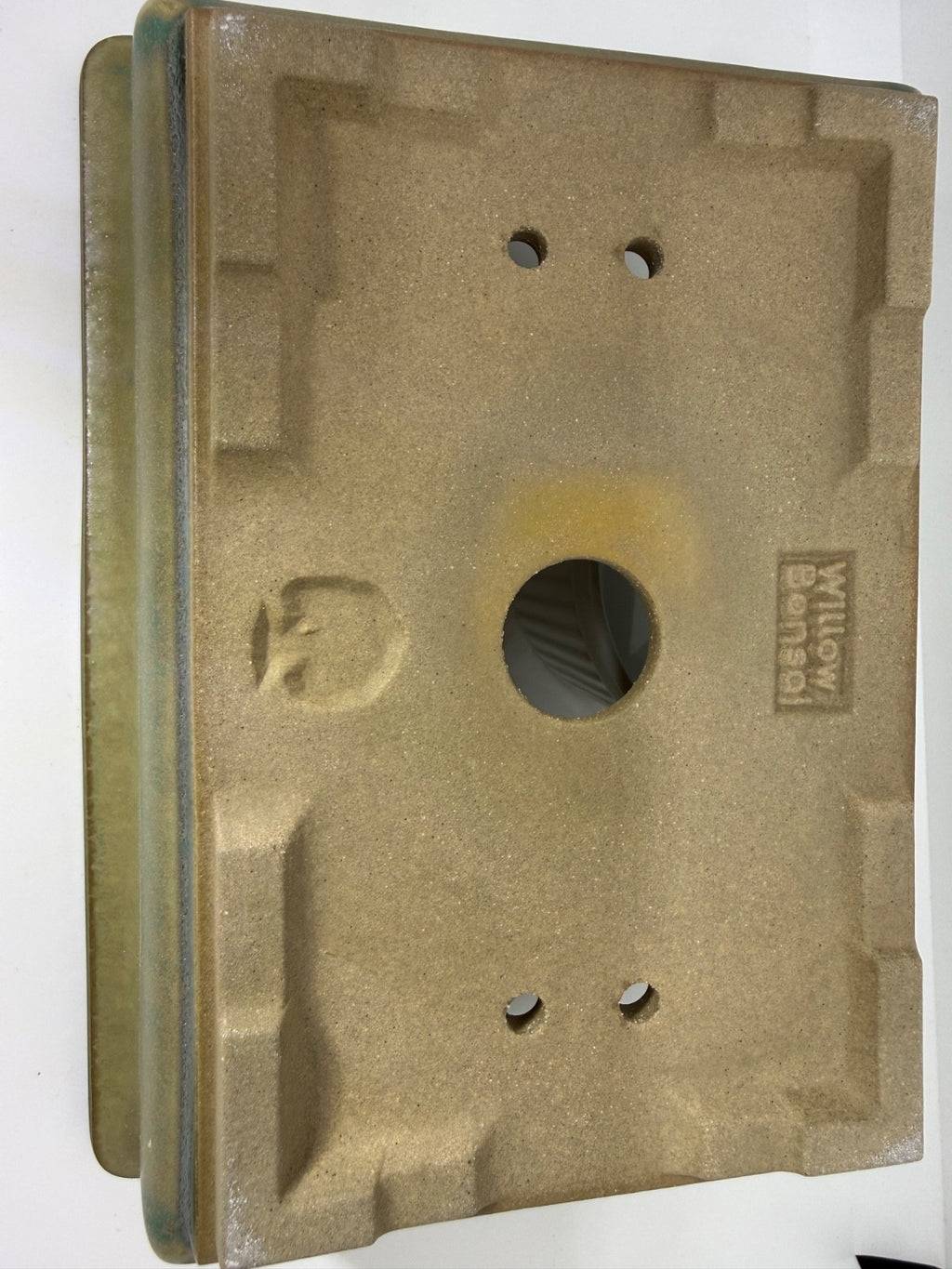 Underside of the rectangular pot showing corner feet, drainage openings and a Willow Ceramics stamp