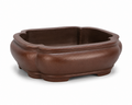 Brown mokko bonsai pot with softly lobed rim, rounded walls and low feet