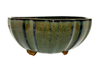 Round fluted bonsai pot with green-gray glaze, dark vertical streaks and short feet